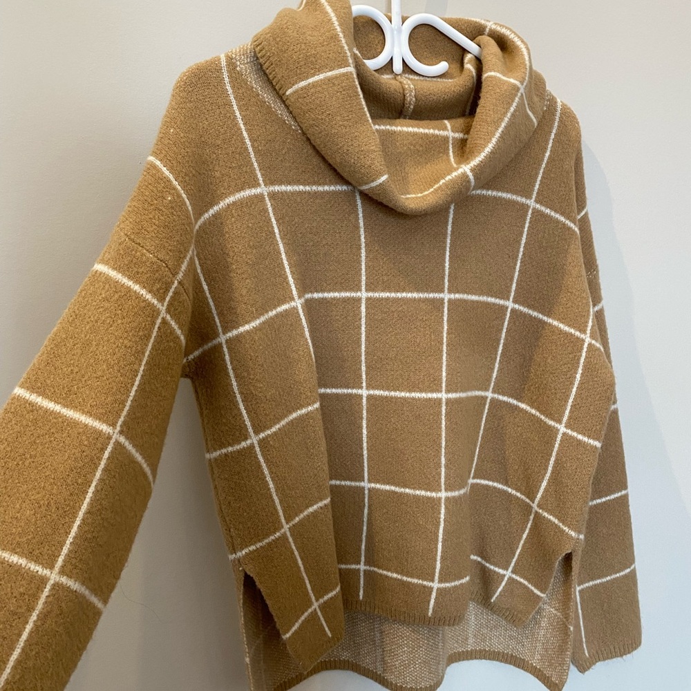 Tan turtleneck sweater